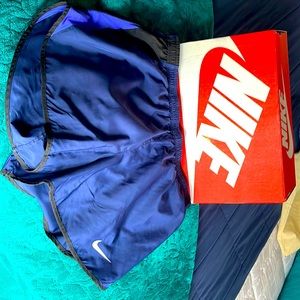 Nike Running shorts VGUC.  Beautiful navy with vibrant blue accents!